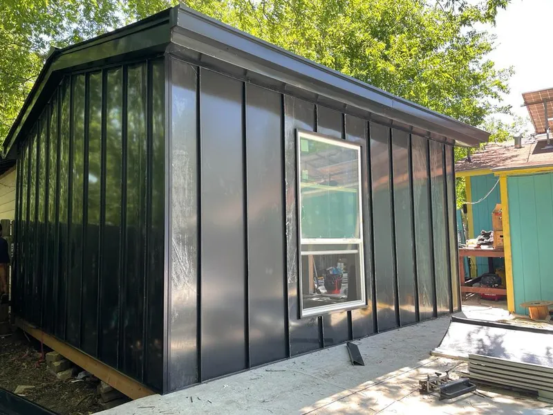 Black standing seam metal wall panels for Metal Roof Installation in Castle Pines Village